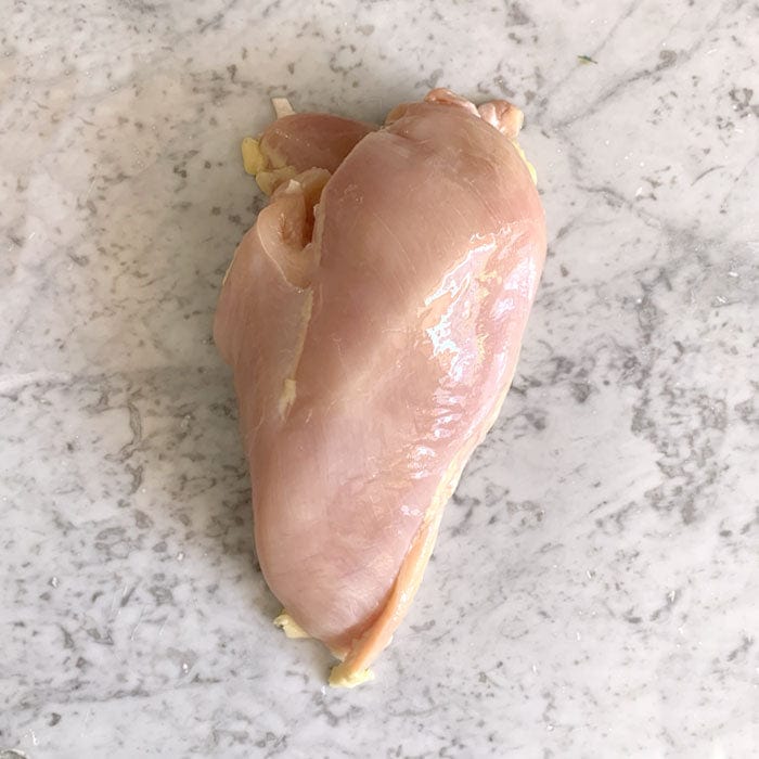 DILMUN Pechuga de pollo con hueso orgánico de libre pastoreo aprox 600g Indomitus